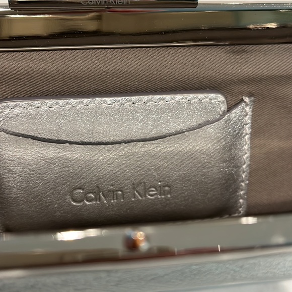 Calvin Klein silver vintage clutch purse with chain strap. - Picture 3 of 9
